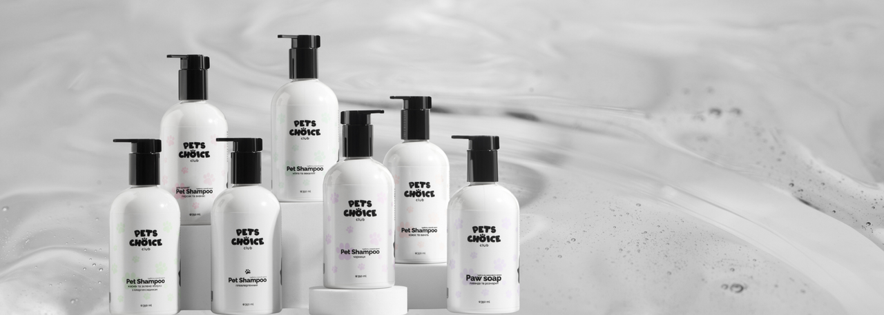 Set of white bottles with black text on a gray background