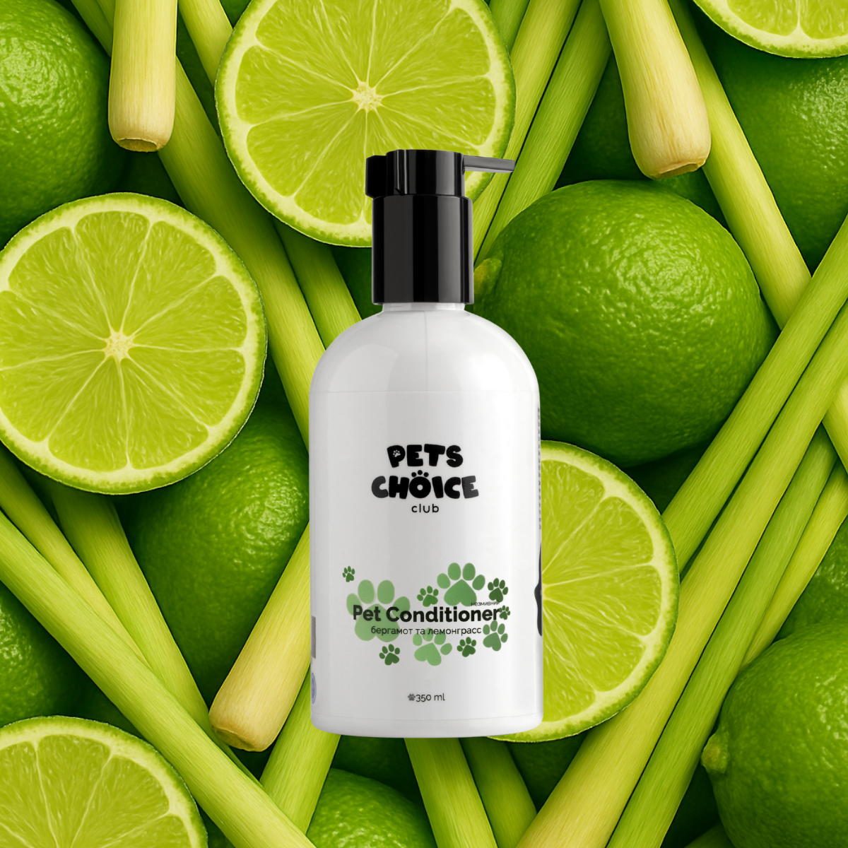 Pet conditioner bottle with pump on a background of green limes and lemongrass