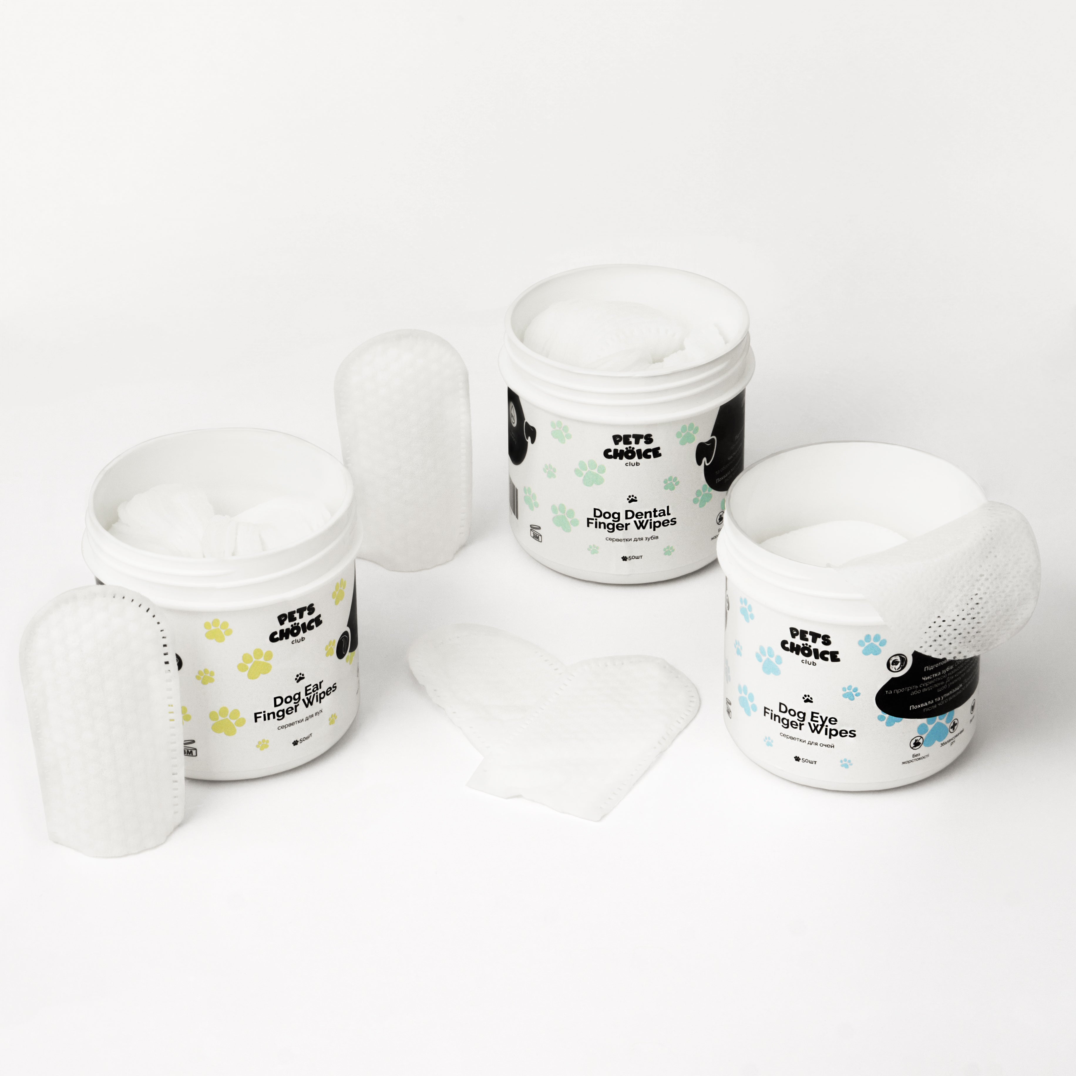 Four containers of 'Pet's Choice' dog ear cleaning wipes on a white background