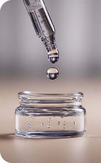 Glass dropper with a drop over a clear glass jar on a neutral background