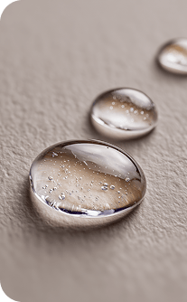 Close-up of water droplets on a textured surface