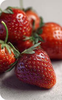 Close-up of fresh strawberries on a light background
