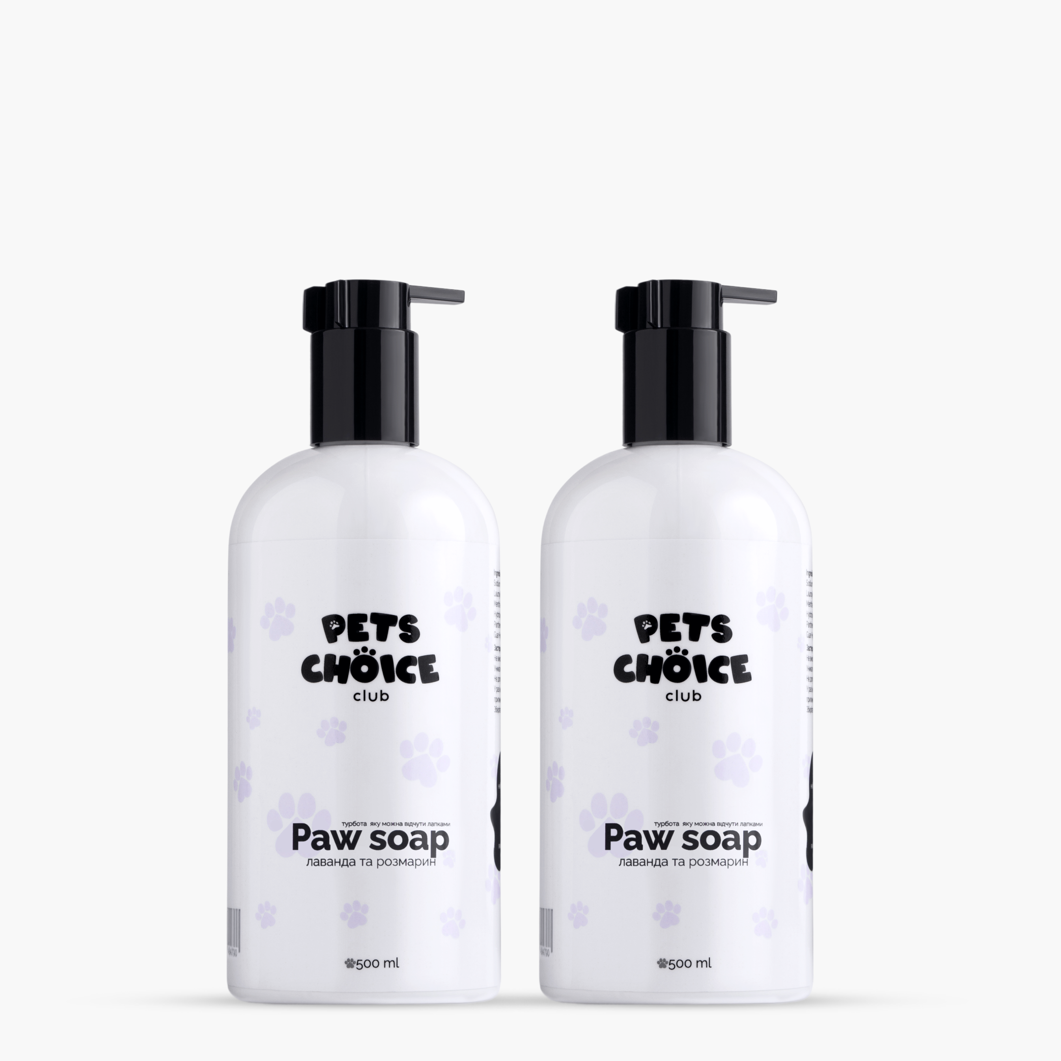 Two bottles of 'Pets Choice Club' Paw Soap on a white background