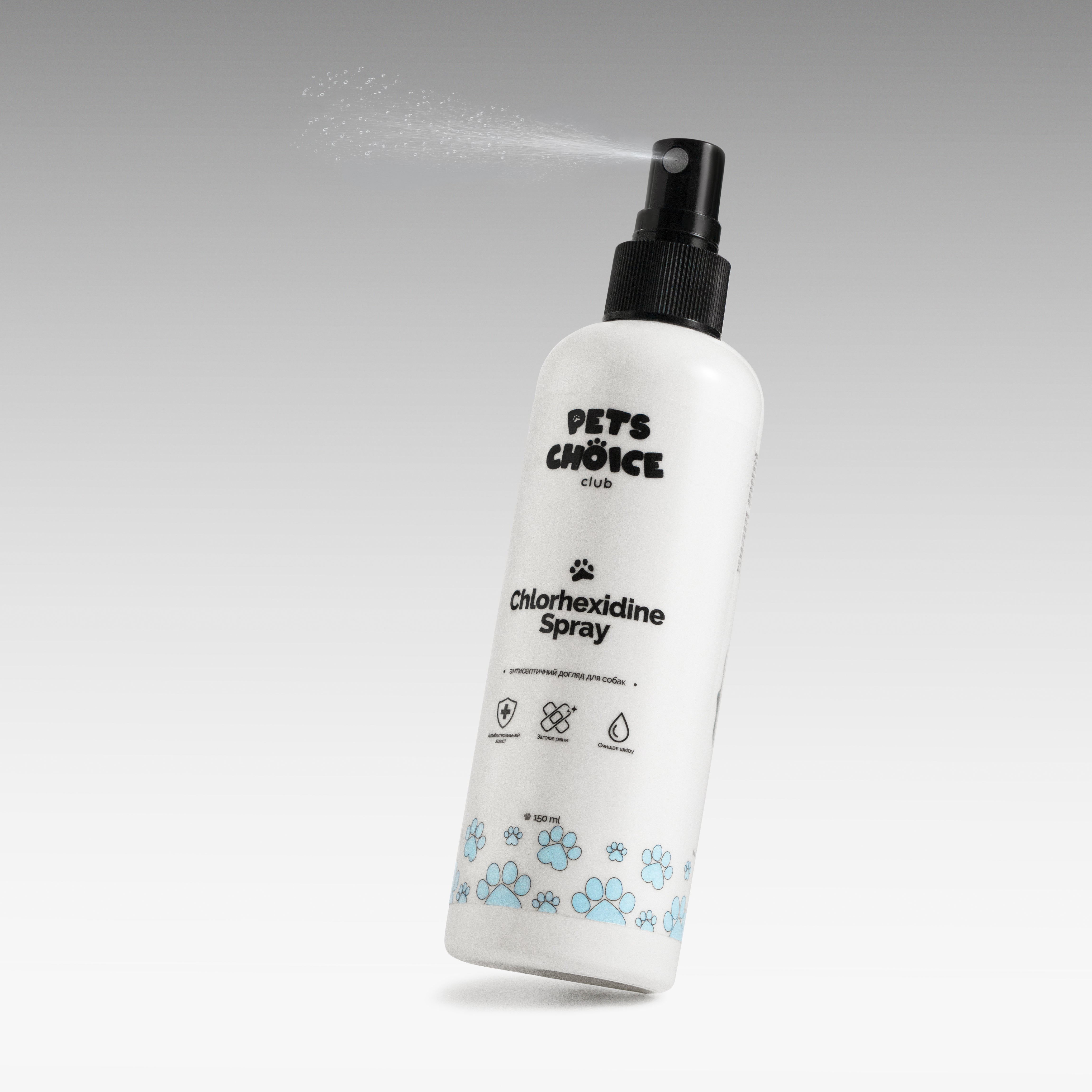 White bottle of Pets Choice Chlorhexidine Spray with black nozzle on a gray background